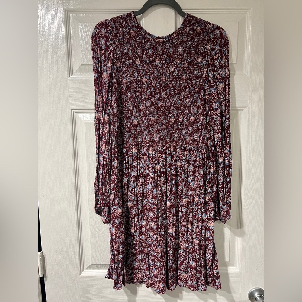 Never worn maroon floral dress. Armpit to armpit 14”  but stretches; length 34”